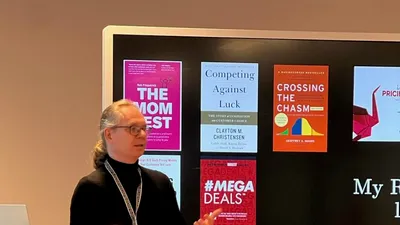 Maarten Laruelle sharing recommended reading at a pricing event